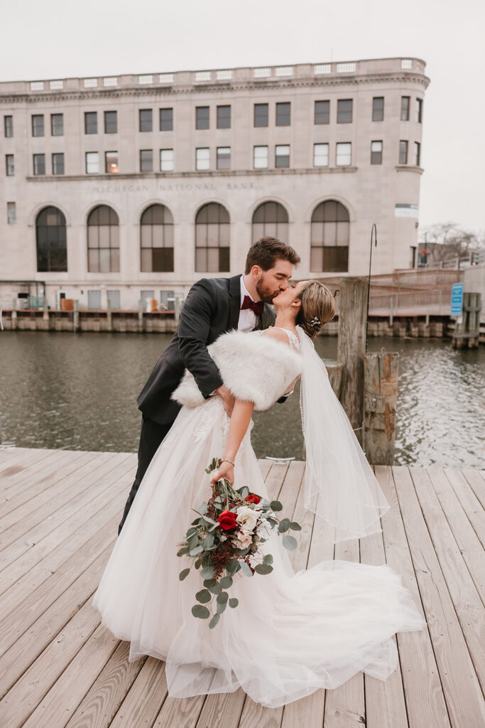 bride and groom portraits on the Black River in Port Huron