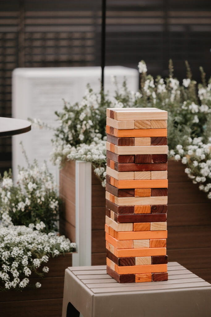 outdoor jenga set at wedding venue reception, The Collins Off Main