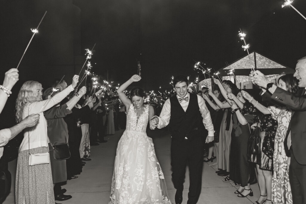 Bride and Groom running through sparkler exit at Michigan wedding, The Collins Off Main, Chelsea, Ann Arbor