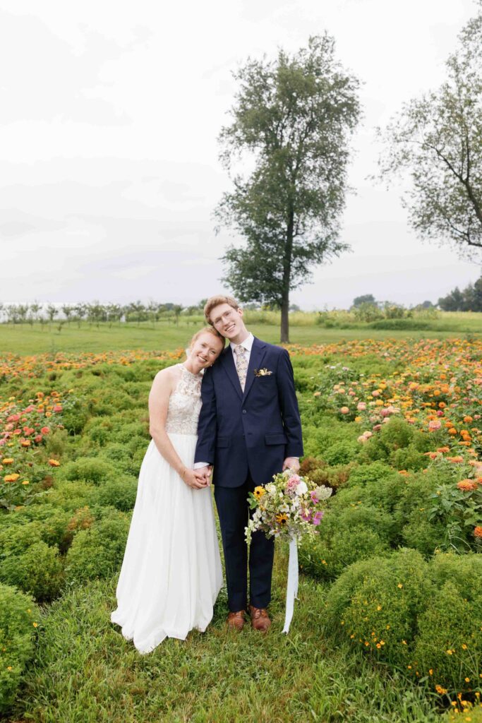 Of the Land Wedding Venue - Bridal Portrait in Flower Field